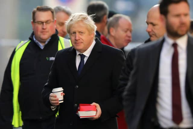 Boris Johnson has spokes of how plant-based 'bio-engineered hamburgers' could soon become commonplace (Picture: Simon Dawson/WPA pool/Getty Images)