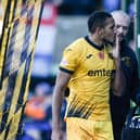 Livingston's Cristian Montano blows a kiss at Rangers fans as he makes his way round to the dugout.