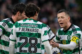 Celtic's Callum McGregor talks to Matt O'Riley and Paulo Bernardo during the draw against Kilmarnock.