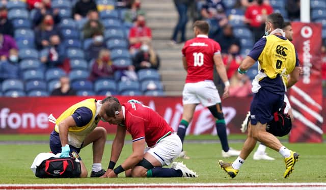 Alun Wyn Jones receives medical attention at Murrayfield. He has now been passed fit to rejoin the Lions in South Africa. Picture: Andrew Milligan/PA Wire