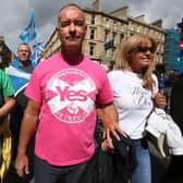 Tommy Sheridan with his wife Gail at a pro-independence march in Glasgow in 2015. Picture: PA