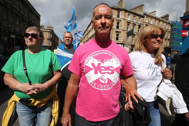 Tommy Sheridan with his wife Gail at a pro-independence march in Glasgow in 2015. Picture: PA
