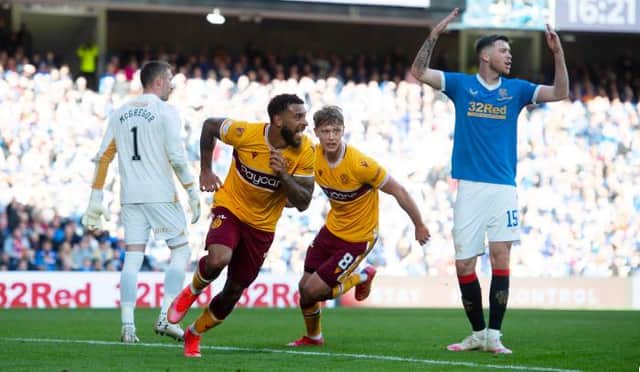 Rangers defender Jack Simpson (right) throws up his hands in despair after Kaiyne Woolery scored Motherwell's equaliser in the 1-1 draw at Ibrox on Sunday. (Photo by Craig Foy / SNS Group)