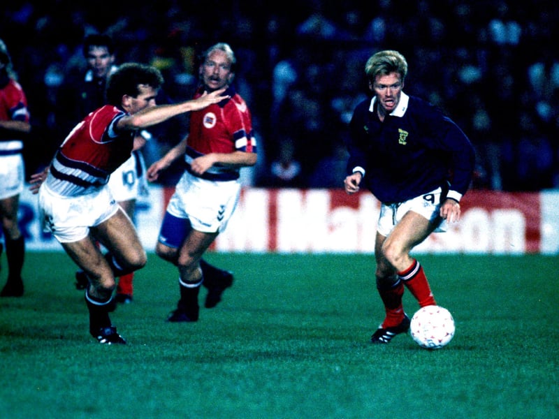 Among the most controversial strikers of his era, but also one of the most potent, as 14 goals in 38 appearances attests, including doubles against both Spain and France. He even scored a winning goal on his debut in 1984 against Wales when he was still a Watford player. Six goals in eight appearances went a long way to getting Scotland to the 1990 World Cup, by which time he had distinguished himself for reasons other than his obvious talent by becoming the first high-profile Roman Catholic to sign for Rangers. His penchant for a night out was also on display at Italia '90, when he was photographed on a night out with teammate Jim Bett at a time of intense national anguish following the 1-0 defeat to Costa Rica in the opening game. Johnston scored a penalty in the must-win next game v Sweden but was thwarted by a miracle late save from Brazilian ‘keeper Taffarel in the final match, with Scotland losing 1-0 and needing a draw to progress. Although he won two more caps post Italia ‘90, he did not add to an already impressive goals tally. He is currently tenth in the all-time list of scorers.