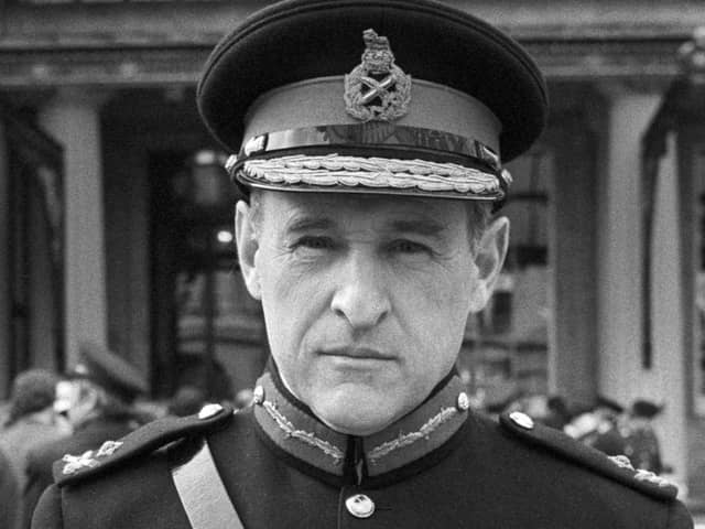 General Sir Frank Kitson at Buckingham Palace to receive his knighthood in 1980