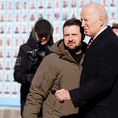 US President Joe Biden (R) is greeted by Ukrainian President Volodymyr Zelensky (L) during a surprise visit to Kyiv.