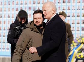 US President Joe Biden (R) is greeted by Ukrainian President Volodymyr Zelensky (L) during a surprise visit to Kyiv.