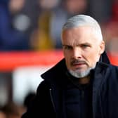 Jim Goodwin, who insists he just needs time to complete Aberdeen's "transition" rather than assurances over his job following Wednesday's 5-0 defeat by Hearts.