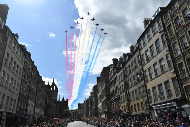Red Arrows flypast after the National Service of Thanksgiving and Dedication for King Charles III and Queen Camilla, and the presentation of the Honours of Scotland, at St Giles' Cathedral in Edinburgh. Picture: Mark Runnacles/Getty Images