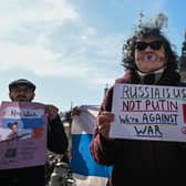 Russians protest against Vladimir Putin's war on Ukraine but in Krakow, Poland, not Russia, where they would be quickly arrested (Picture: Omar Marques/Getty Images)