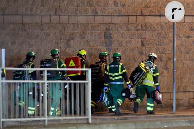 Medics and rescuers at the scene of the 2017 Manchester Arena bombing in which 22 people died