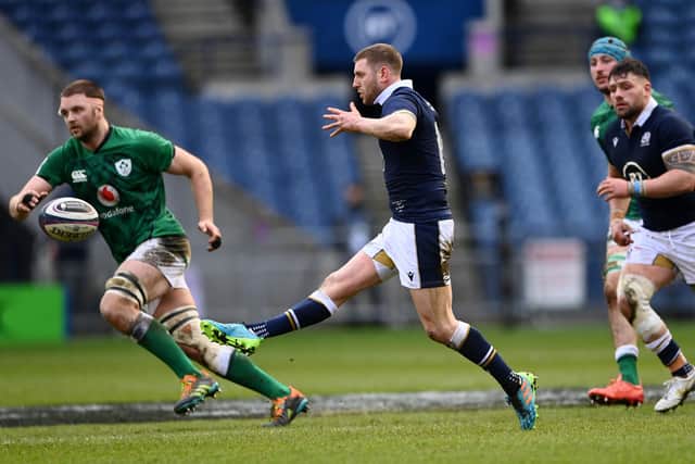 Finn Russell kicks the ball on in the play that would bring him Scotland's first-half try. Picture: Stu Forster/Getty Images