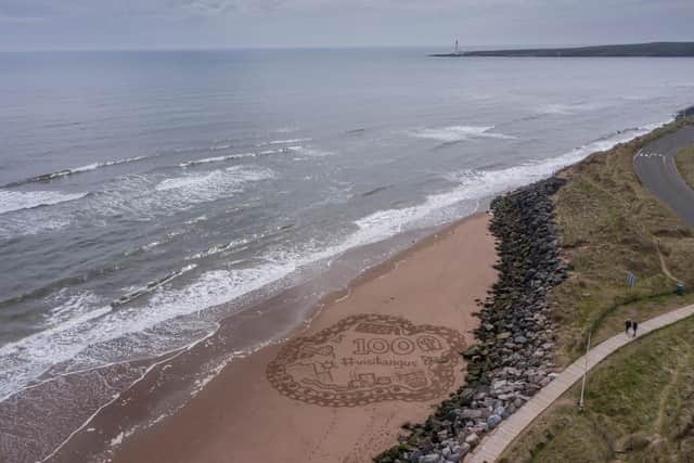 The new Visit Angus campaign is launched on Montrose Beach with Scurdie Ness lighthouse in the background. PIC: Contributed.