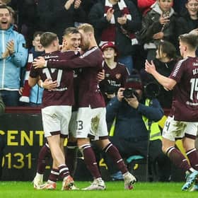 Hearts' Kenneth Vargas celebrates with team-mates after scoring against Motherwell.