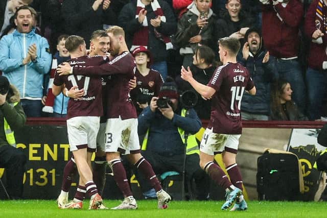 Hearts' Kenneth Vargas celebrates with team-mates after scoring against Motherwell.