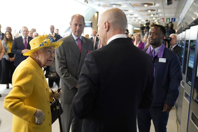 Queen Elizabeth II and The Earl of Wessex meet staff who have been key to the Crossrail project, as well as Elizabeth Line staff who will be running the railway, including apprentices, drivers, and station staff at Paddington station in London, to mark the completion of London's Crossrail project