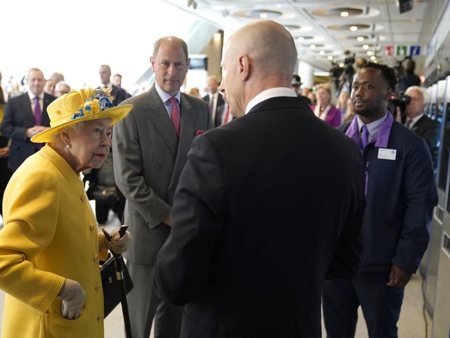 Queen Elizabeth II and The Earl of Wessex meet staff who have been key to the Crossrail project, as well as Elizabeth Line staff who will be running the railway, including apprentices, drivers, and station staff at Paddington station in London, to mark the completion of London's Crossrail project