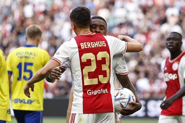 Ajax's forward Steven Berghuis and teammate Steven Ajax's Dutch forward Steven Bergwijn celebrate their 4-0 win over Cambuur.