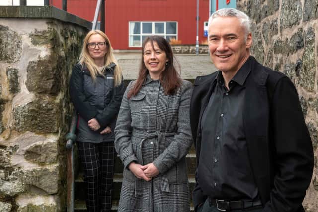 From left: paralegal Jennifer Smith and associate Laura Sinclair with colleague Neil Risk. Picture: Dave Donaldson.