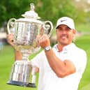 Brooks Koepka shows off the Wanamaker Trophy after winning the 105th PGA Championship at Oak Hill Country Club in Rochester, New York. Picture: Kevin C. Cox/Getty Images.