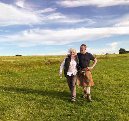 Jamie Menzies and his mother Monica on the family farm.