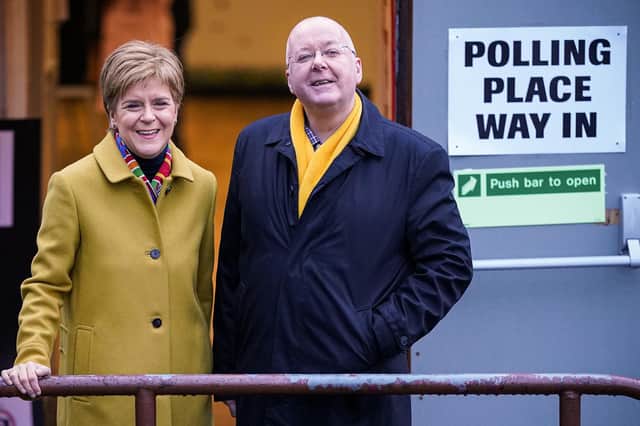 Nicola Sturgeon votes with her husband Peter Murrell at Broomhouse Community Hall in Ballieston on December 2019, in Glasgow, Scotland. (Photo by Jeff J Mitchell/Getty Images)