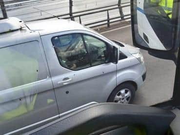 Officers checking on a van driver from their undercover cab. Picture: Police Scotland