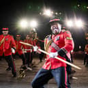 Members of the US Air Force Honor Guard Drill Team perform on the esplanade of Edinburgh Castle at this year's Royal Edinburgh Military Tattoo. Picture: Jane Barlow/PA Wire