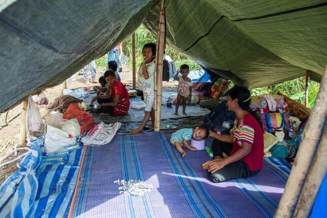 Myanmar refugees and their children, who fled a surge in violence as the military cracks down on rebel groups, at a camp in Nawphewlawl near the Myanmar-Thailand border in Kayin state.