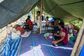 Myanmar refugees and their children, who fled a surge in violence as the military cracks down on rebel groups, at a camp in Nawphewlawl near the Myanmar-Thailand border in Kayin state.