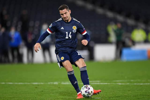 Kenny McLean scores the decisive fifth penalty to win the shootout against Israel.