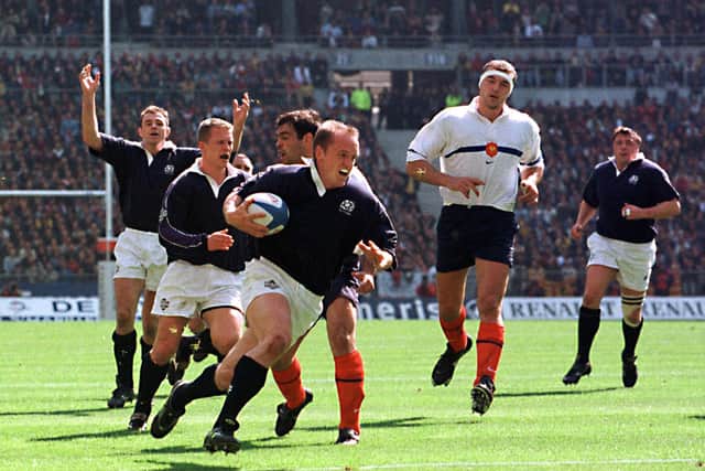 Gregor Townsend runs in for his try against France in the 36-22 victory at the Stade de France in 1999. Picture: Neil Hanna