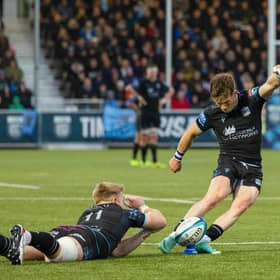 Glasgow Warriors' George Horne scores a second half conversion, with Kyle Steyn assisting, during the United Rugby Championship play-off quarter-final against DHL Stormers at Scotstoun Stadium, on June 8, 2024. (Photo by Ross Parker / SNS Group)