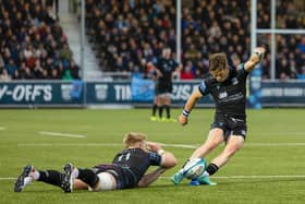 Glasgow Warriors' George Horne scores a second half conversion, with Kyle Steyn assisting, during the United Rugby Championship play-off quarter-final against DHL Stormers at Scotstoun Stadium, on June 8, 2024. (Photo by Ross Parker / SNS Group)