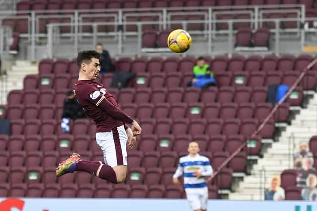 Hearts' Jamie Walker scores with a textbook header in the 1-1 draw with Morton on Saturday. It was the winger's 50th goal for the club (Photo by Ross MacDonald / SNS Group)
