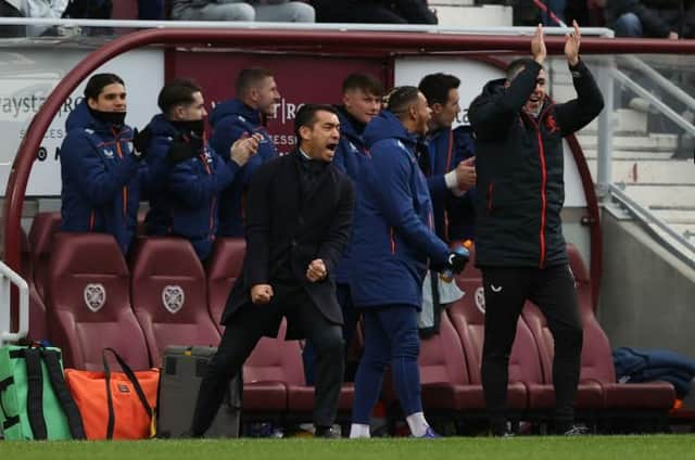 Rangers manager Giovanni van Bronckhorst celebrates as his team score in their 2-0 win over Hearts at Tynecastle. (Photo by Craig Williamson / SNS Group)