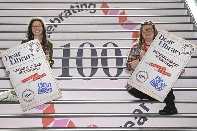 Wester Hailes librarians Jessi Dimmock and Susannah Leake celebrate the opening of the centenary exhibition 'Dear Library' on the main staircase of the National Library of Scotland (Picture: Neil Hannah)