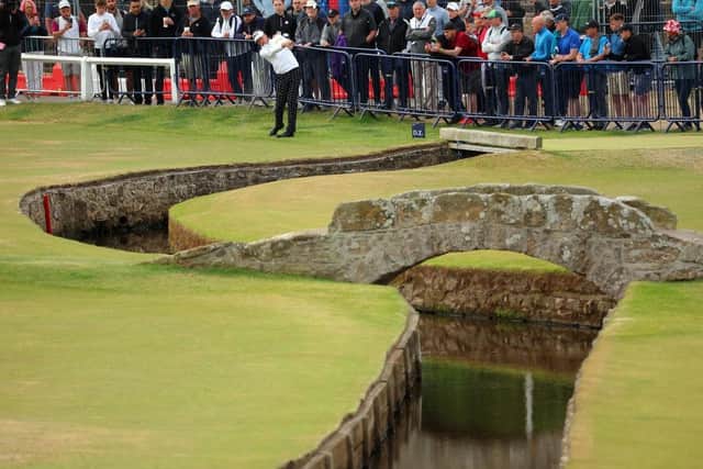 Ian Poulter plays his second shot on the first hole at St Andrews. Picture: Kevin C. Cox/Getty Images.