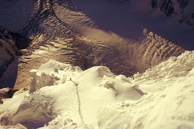 Sunrise on the Cauliflower Towers, with the crevasses of the Kangshung Galcier nearly 1,000 metres below