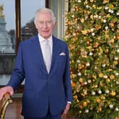 King Charles III, renowned for his environmentalism, will deliver his second speech as monarch from a room Buckingham Palace decorated with a living Christmas tree – which will be replanted after the festive period. Picture: Jonathan Brady/PA Wire