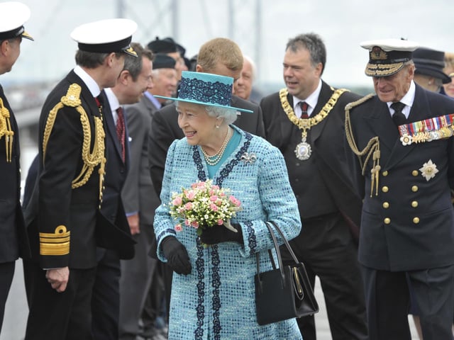 Her Majesty The Queen and Prince Philip visiting the viewing area of the Forth Road Bridge in 2014 to unveil a new plaque marking the 50th anniversary of her opening the bridge.
