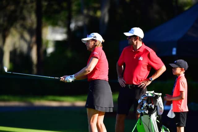 Annika Sorenstam practices her chipping with her son and husband looking on prior to the final round of the Gainbridge LPGA at Lake Nona in Orlando, Florida. Picture: Julio Aguilar/Getty Images.