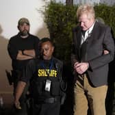 Alex Murdaugh is led outside the Colleton County Courthouse by sheriff's deputies after being convicted of two counts of murder.