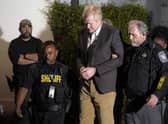 Alex Murdaugh is led outside the Colleton County Courthouse by sheriff's deputies after being convicted of two counts of murder.