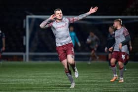 Arbroath's Ali Adams celebrates after scoring to make it 2-1 against Raith.