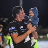 JP du Preez made a winning Glasgow Warriors debut against Cardiff and celebrated with his young son, Isak. (Photo by Ross MacDonald / SNS Group)