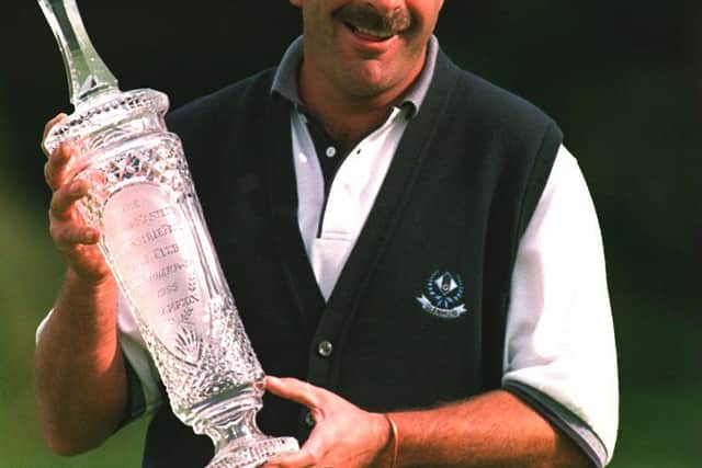 Sam Torrance shows off the trophy after landing one of his European Tour title triumphs in the 1995 British Masters at Collingtree Park. Picture: David Rogers/ALLSPORT