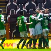 The Hibs' players celebrate Martin Boyle opening the scoring at Motherwell.