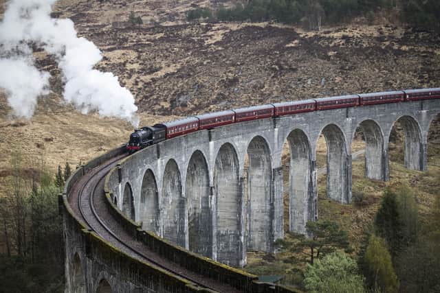 The first Jacobite Express of the 2021 season  crosses the Glenfinnan Viaduct on its way to Mallaig from Fort William. Picture by Jane Barlow/PA