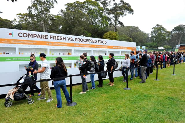 People queue to taste the difference between fresh and processed food during Chipotle's Cultivate San Francisco: Food, Music and Ideas Festival in San Francisco, California  (Picture: Steve Jennings/Getty Images for Chipotle Mexican Grill, Inc.)
